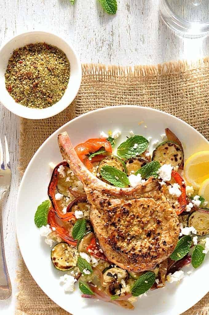 Lemon Pepper Pork with Grilled Veg and Feta Couscous, top down view