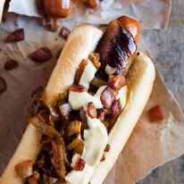 Bacon Wrapped Hot Dogs with Cheese Sauce