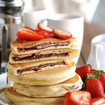 Nutella Stuffed Pancakes - frozen Nutella discs makes it a breeze to make the Nutella stuffed pancakes!