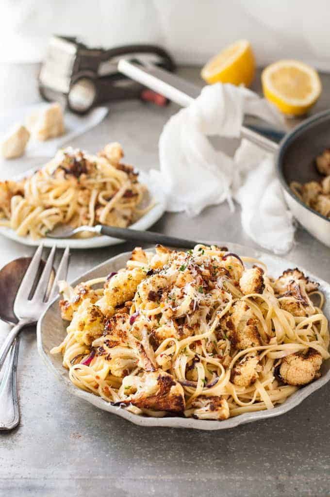 Garlic Butter Cauliflower Pasta with Pangritata toasted breadcrumbs on a plate, ready to be served.