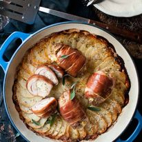 One Pan Prosciutto Wrapped Ricotta Chicken with Scalloped Potatoes - simple to make, elegant enough for company. The chicken adds extra flavor to the golden potatoes!