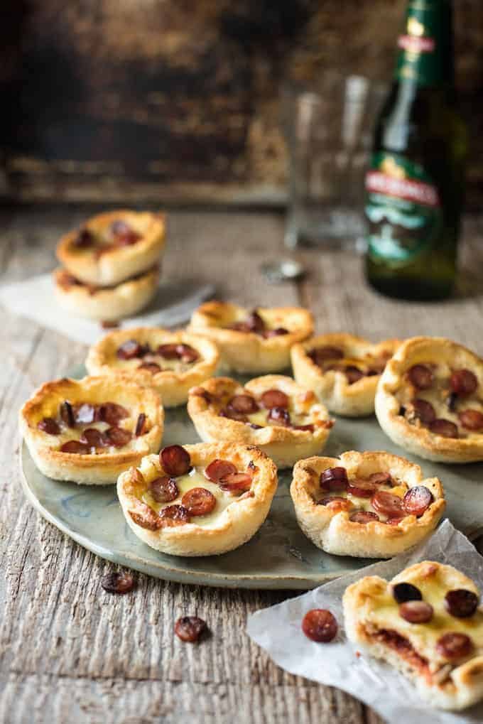 Garlic Bread Mini Pizza - made from plain sandwich bread brushed with garlic butter, these mini pizzas taste like a cross between garlic bread and pizza!