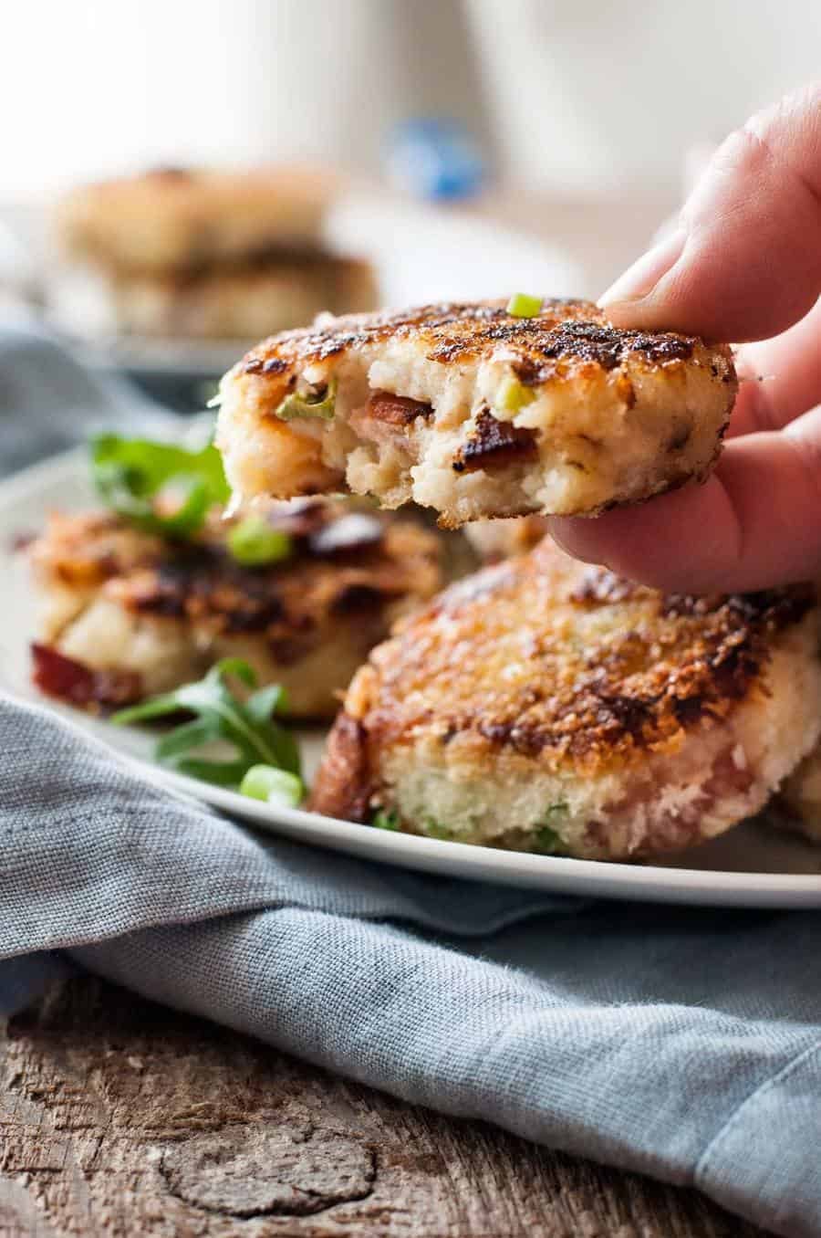 Closeup of Mashed Potato Cakes with Cheese & Bacon