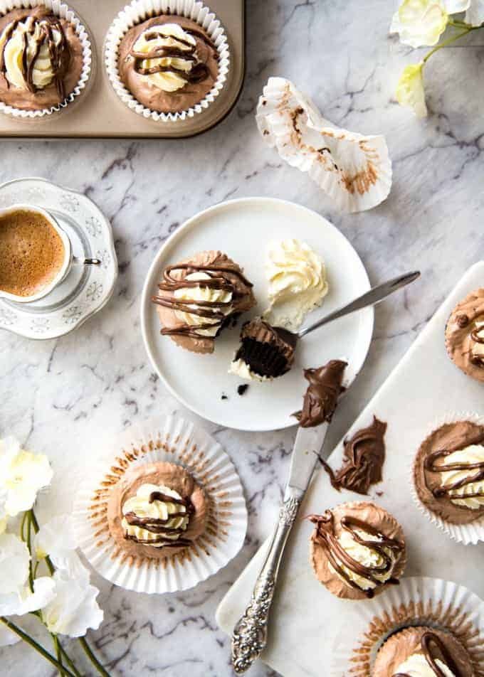 No Bake Nutella Cheesecake - Mini ones made in a muffin tin! A biscuit base and light mousse-like Nutella flavoured cheesecake. Easy to make and completely irresistible! recipetineats.com