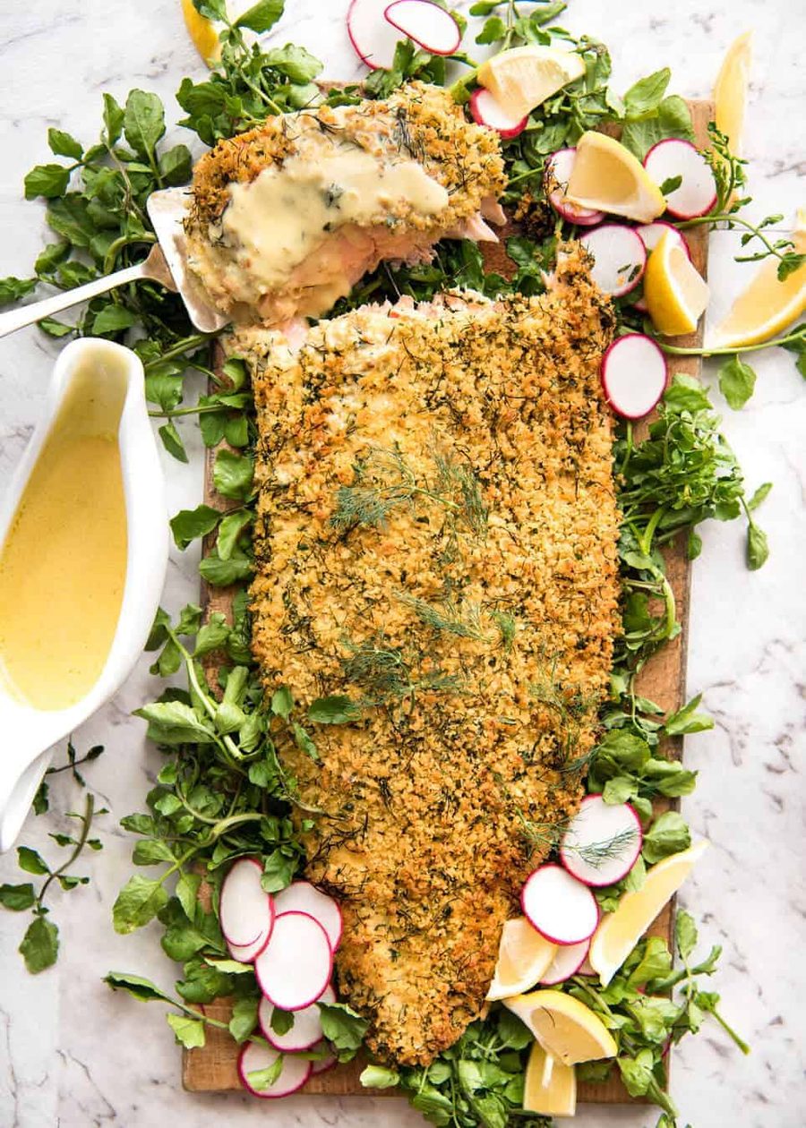 Baked Parmesan Crusted Salmon with Lemon Cream Sauce - easy and fast to make, can be prepared ahead, a stunning centrepiece for Christmas dinner and yet easy enough for midweek. That Lemon Cream sauce is the perfectly finishing tough. recipetineats.com