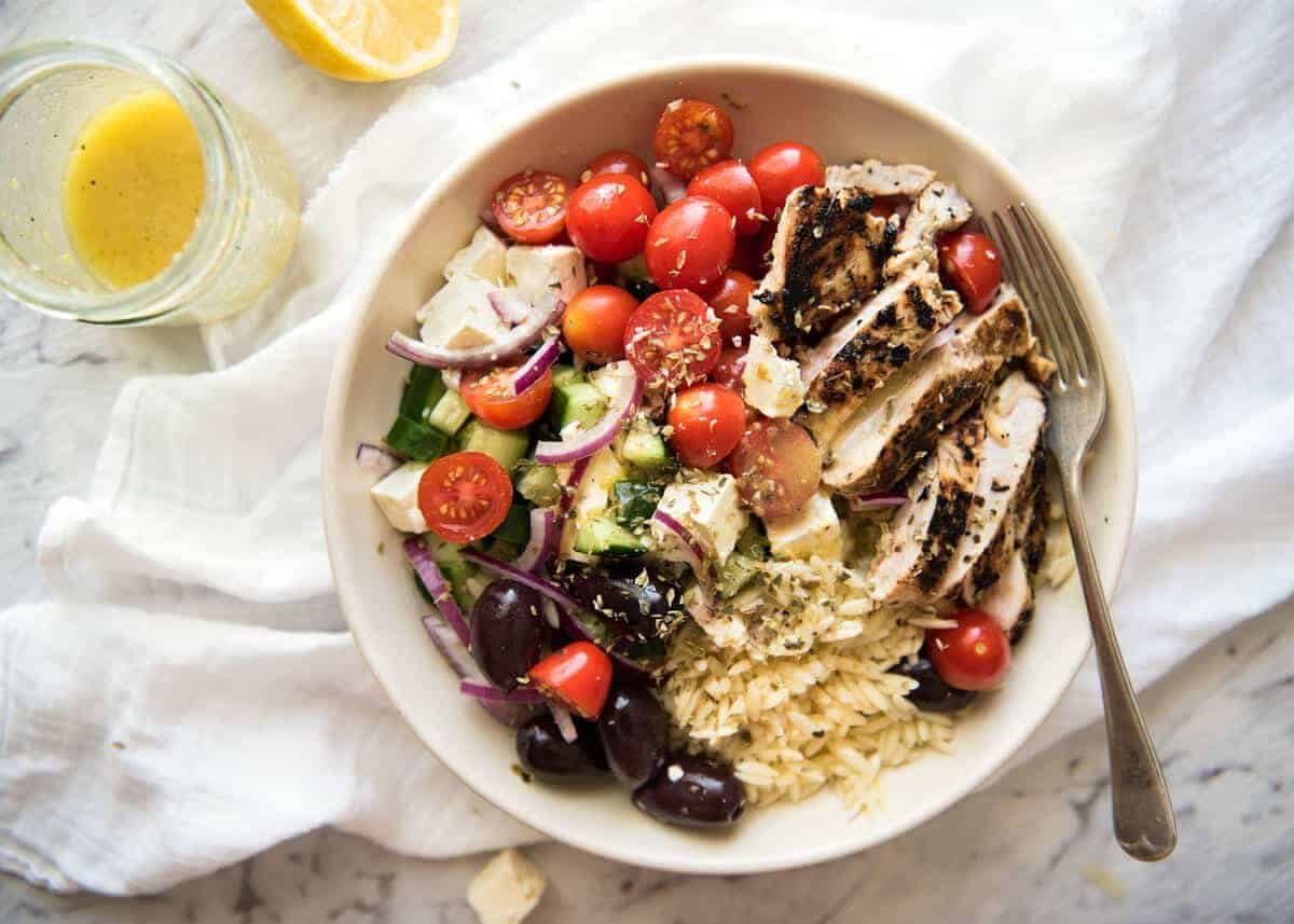 Greek Lemon Orzo Salad (Risoni) - All the fixings of a Greek Salad tossed through orzo / risoni and dressed with a gorgeous zesty lemon vinaigrette. www.recipetineats.com