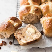 Easy Hot Cross Buns Recipe - perfectly spiced, fluffy and moist, with a no knead, no stand mixer option! www.reciptineats.com