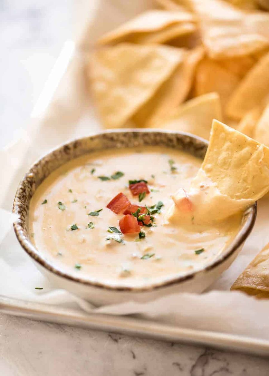 Code cracked: Queso Dip made with real cheese that's ultra silky even when it cools. recipetineats.com