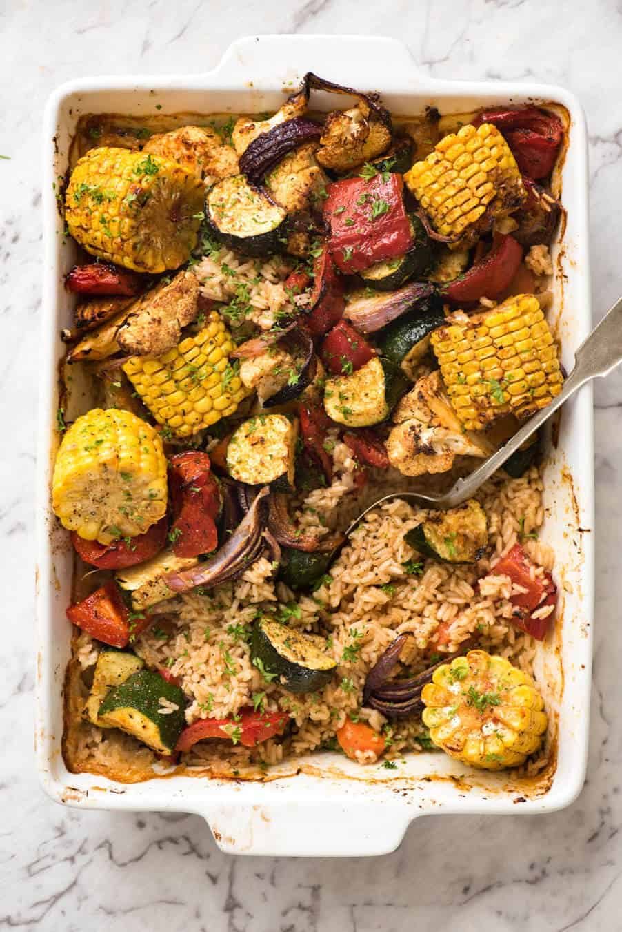 Oven Baked Rice and Vegetables - Fluffy seasoned rice and oven roasted vegetables, all made in ONE pan! Fabulous meal or side, super quick and easy to prep. recipetineats.com