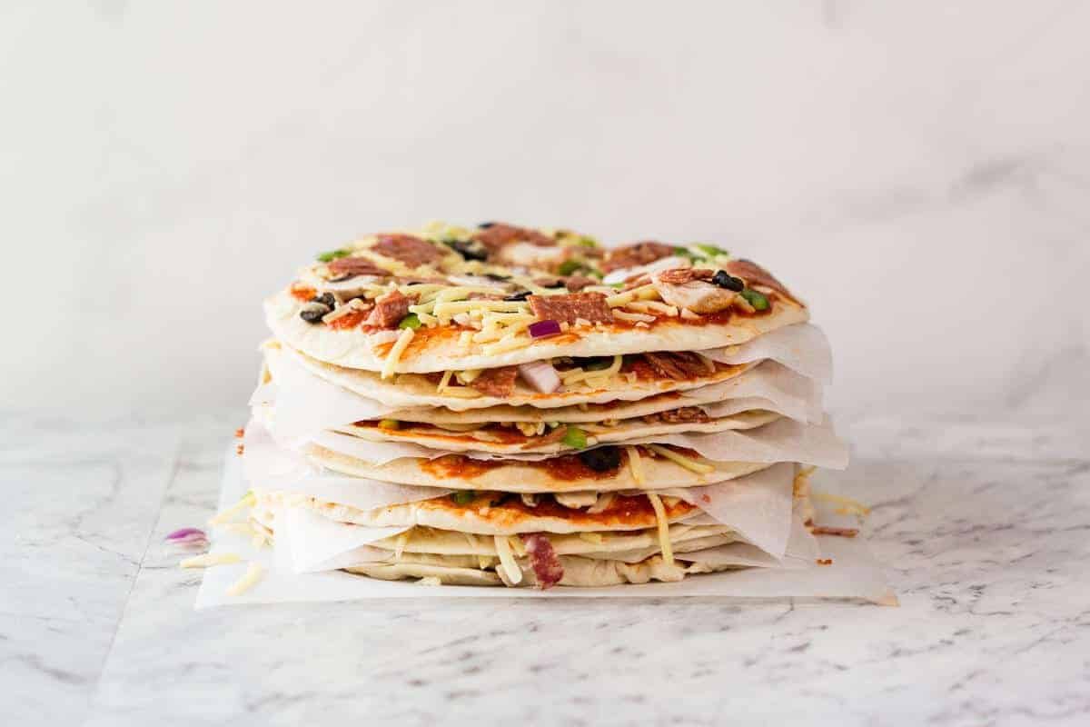 $2 Homemade Frozen Pizzas - quick and easy made using flatbreads, cook from frozen for a terrific Thin & Crispy pizza! www.recipetineats.com