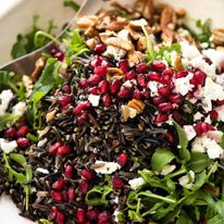 This Wild Rice Salad is a salad for celebrations! Stellar flavour combination - wild rice, pomegranate, pecans, rocket / arugula, green onions, cranberries and feta. recipetineats.com