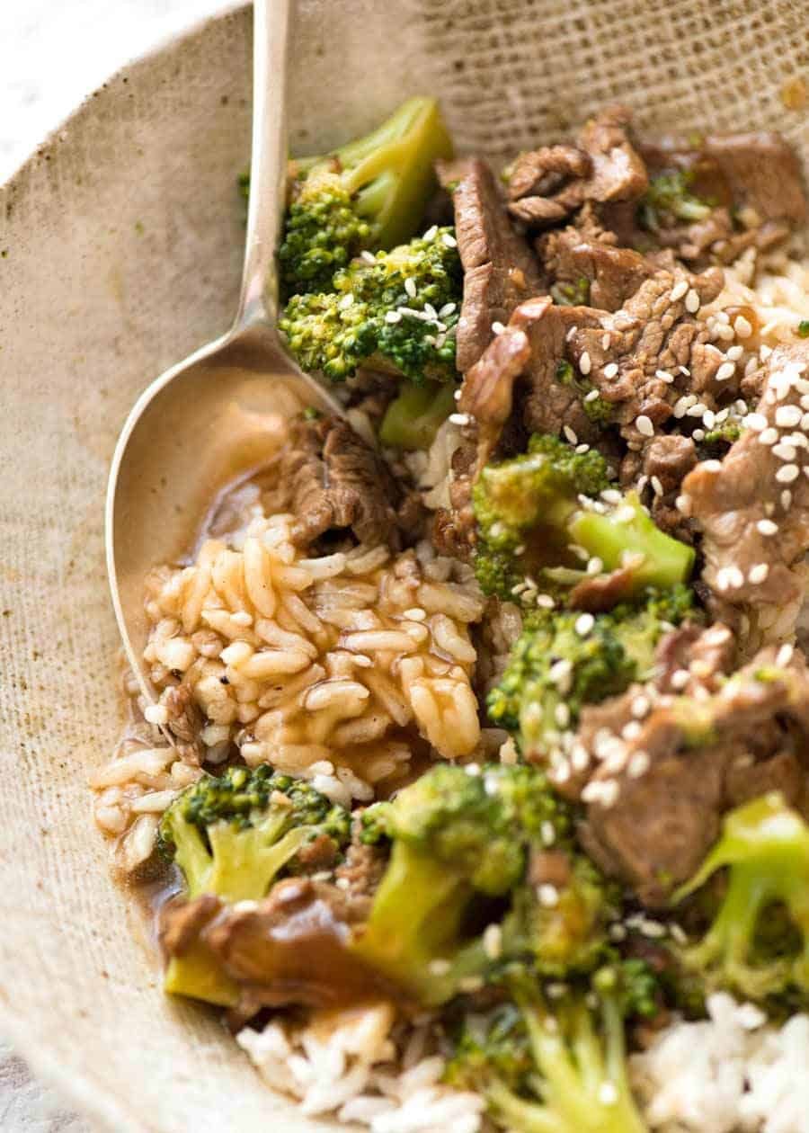 Close up showing sauce soaked rice in a bowl with Chinese Beef and Broccoli