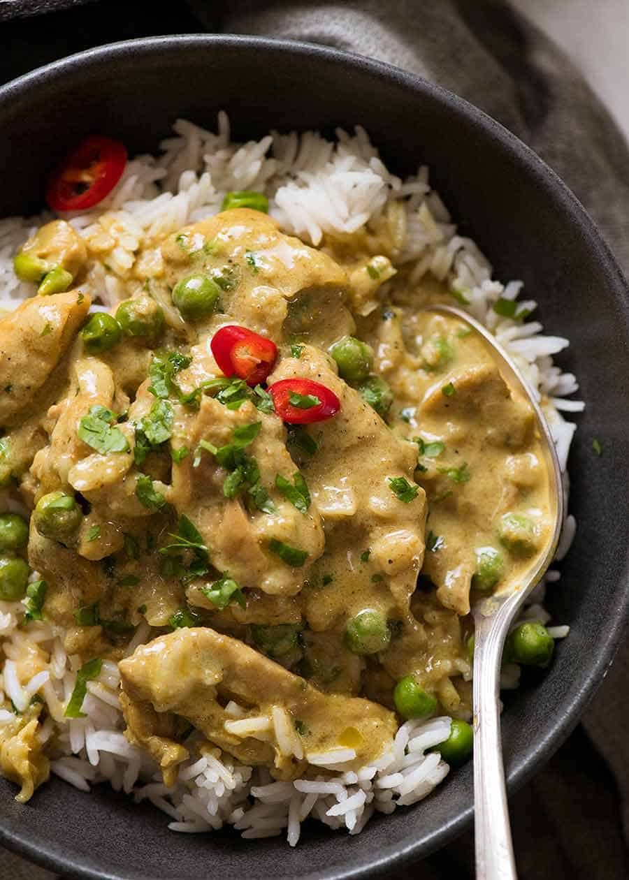 Close up of simple Chicken Curry over rice, ready to be eaten