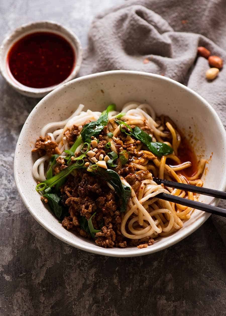 Bowl of spicy Sichuan Dan Dan Noodles, ready to be eaten