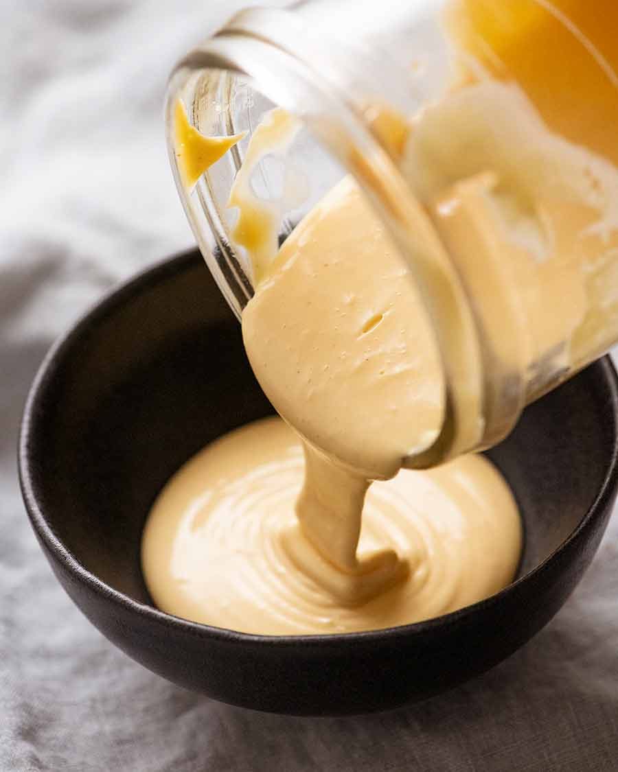 Hollandaise Sauce being poured into bowl