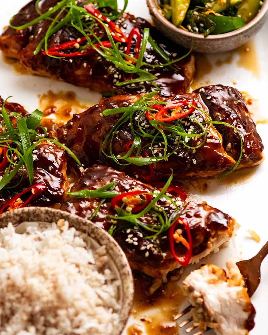 Platter of Asian Glazed Baked Barramundi with a side of coconut rice and Ginger Sesame Cucumber Salad