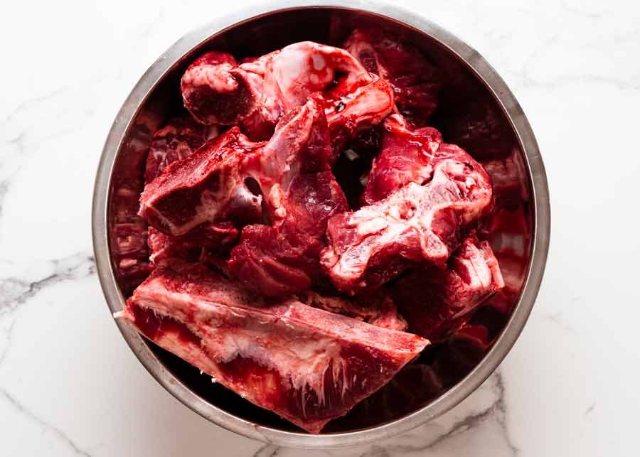 Bowl of raw beef bones for beef stock
