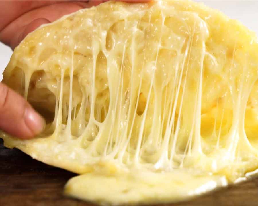 Showing the inside of Cheese Naan