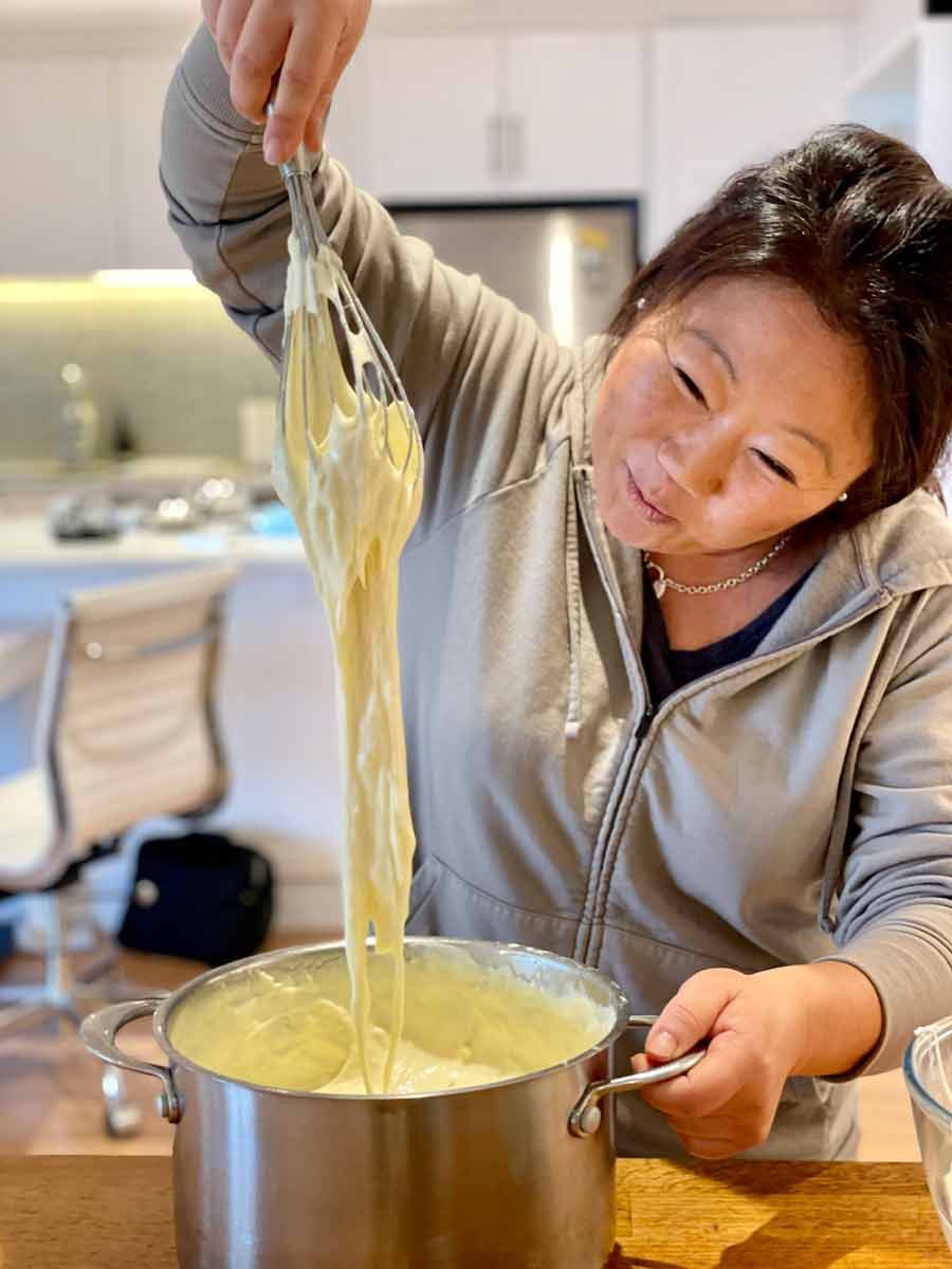 Nagi Dozer cheese pull Mac and Cheese